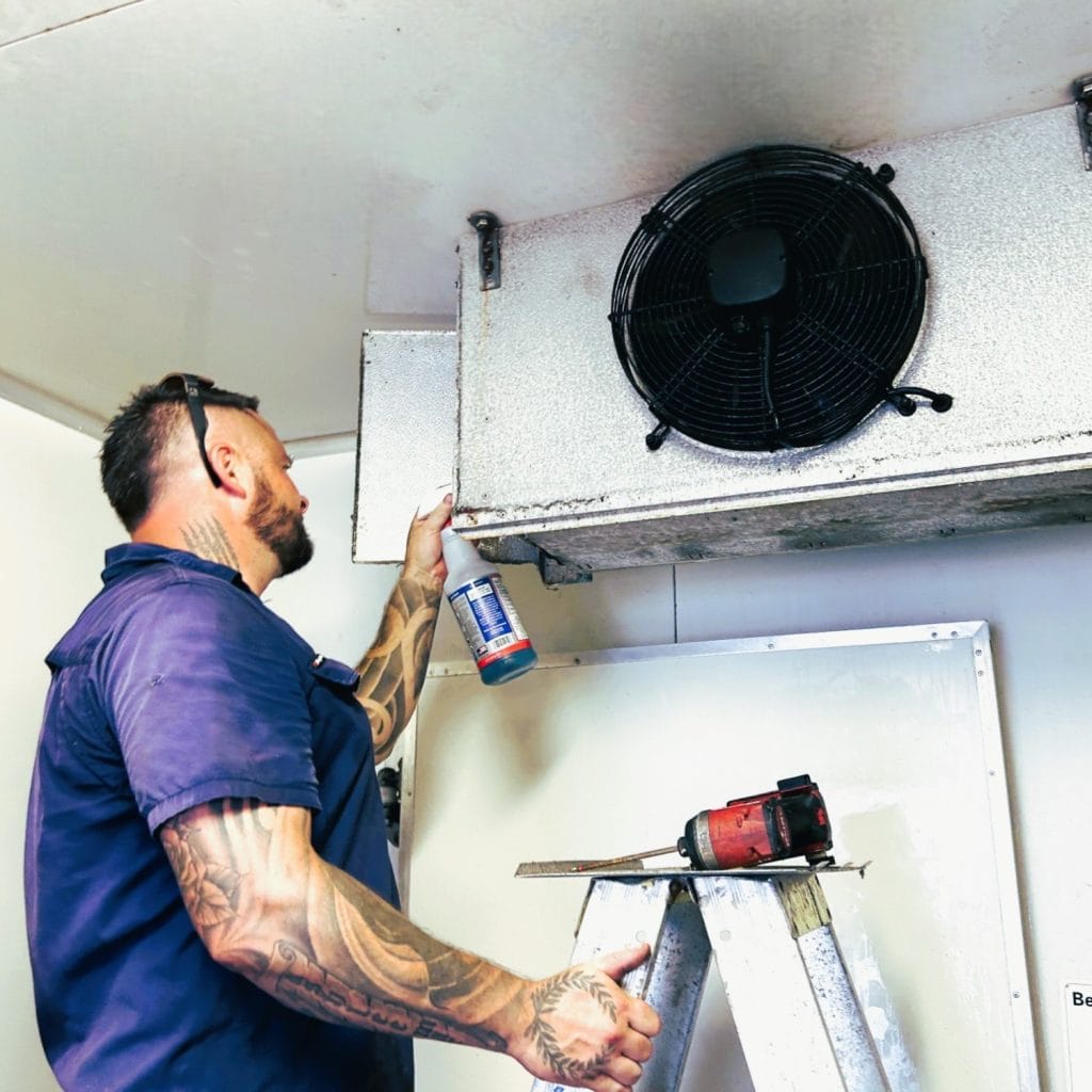 Climascope technicican fixing a commercial cold room refrigeration unit on the Gold Coast